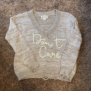 wild fox “don’t care” sweater